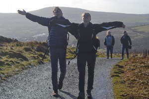 Seniors Nick Navin and Mia Vanderwilt embrace a rare moment of sunshine on a chilly hike.