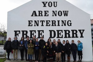 HFB Seattle poses in front of the iconic "Free Derry" sign on a day out on the town.