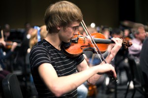 Evan Johanson performing the violin