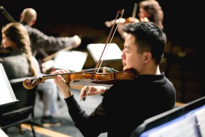 Violin performed by professional accompanying the students