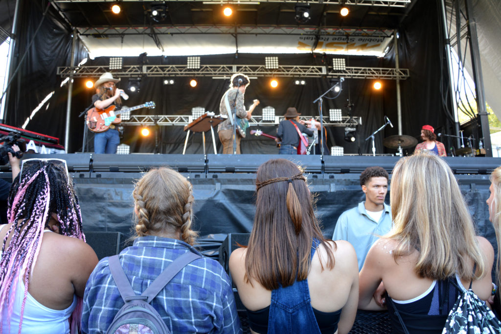 Fans wait for performers at Starbucks stage. Photo by Allison Lane